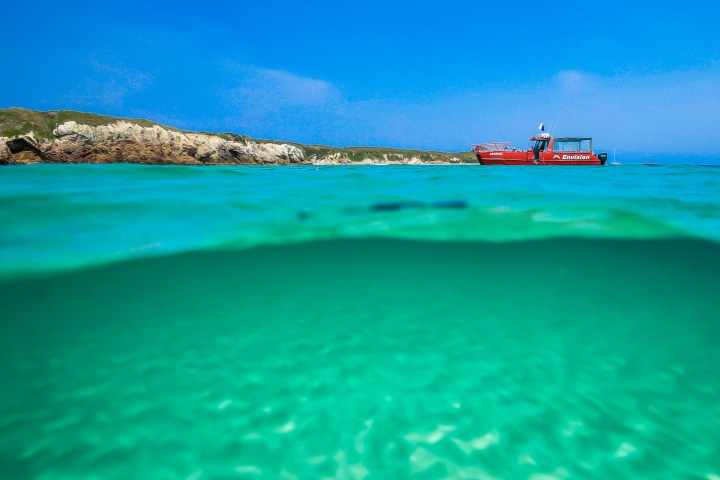 a pool next to a body of water