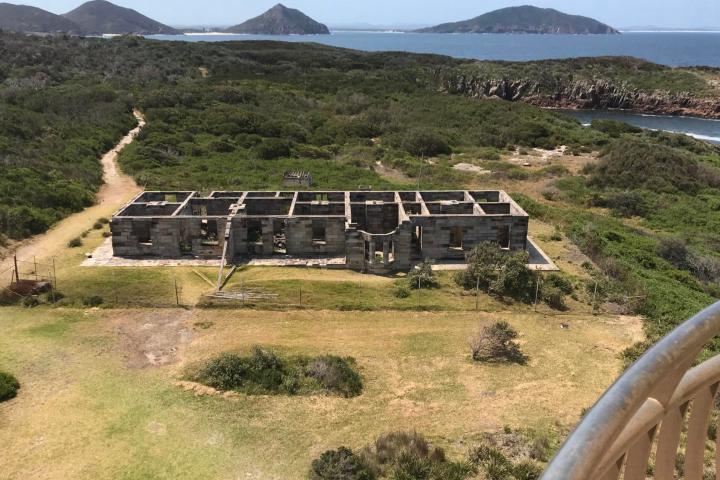 a bench in front of a mountain
