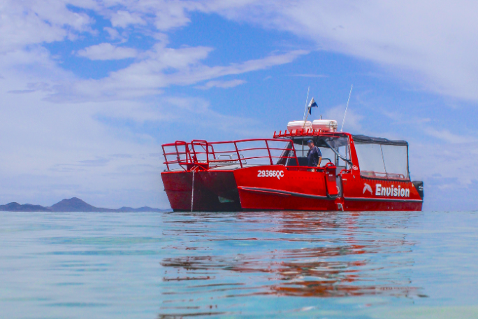 a small boat in a large body of water