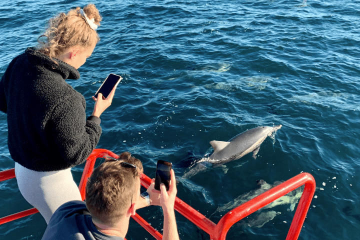 a man that is standing in the water